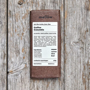 Produkt med brun indpakning og hvid etiket fra Mellow, mærket "Coffee Colombia".